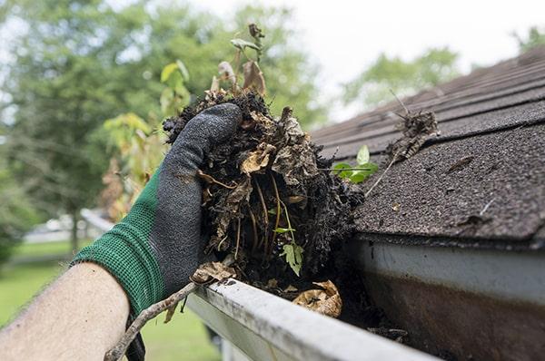 overflowing water, debris spilling over the edges, and sagging gutters are common signs that your gutters need cleaning